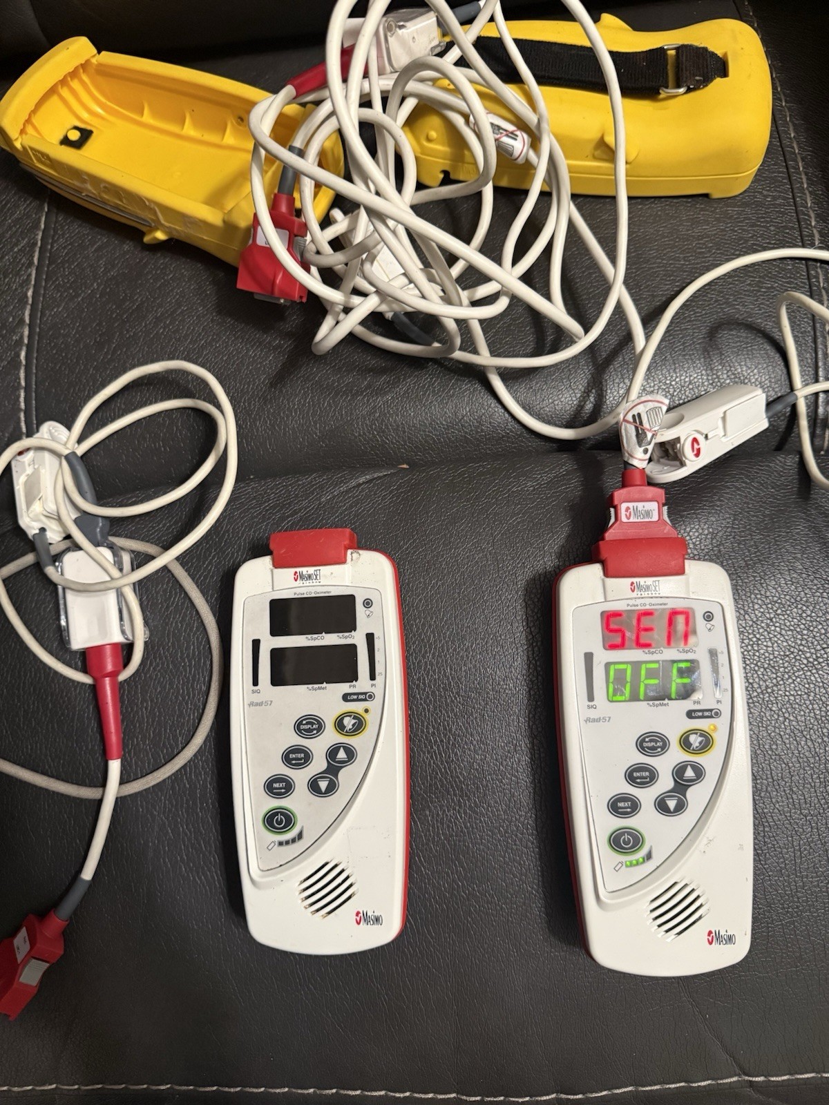 Masimo Rad 57 With Protective Covering And Finger Sensor