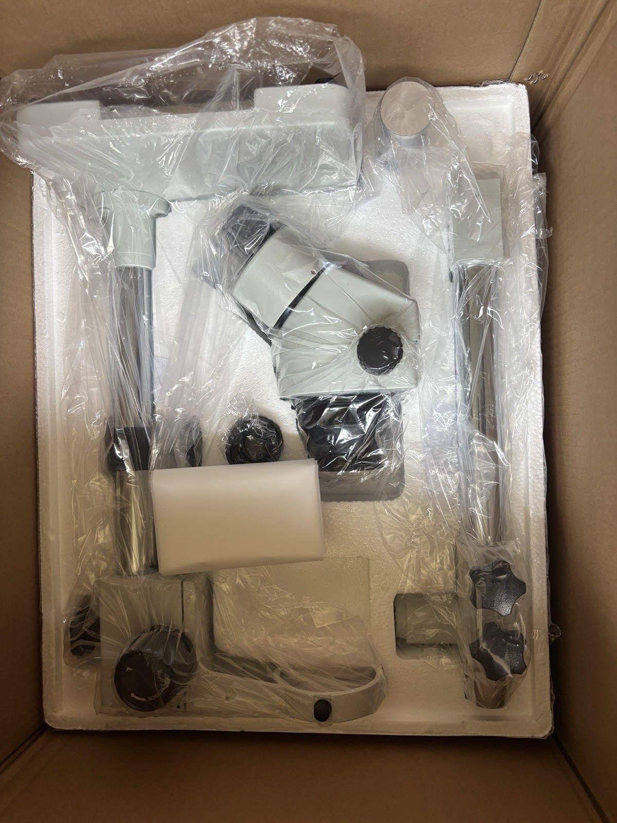 AmScope 7X-45X Stereo Zoom Microscope with Single Arm Boom Stand. SM-3B-203